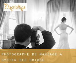 Photographe de mariage à Oyster Bed Bridge